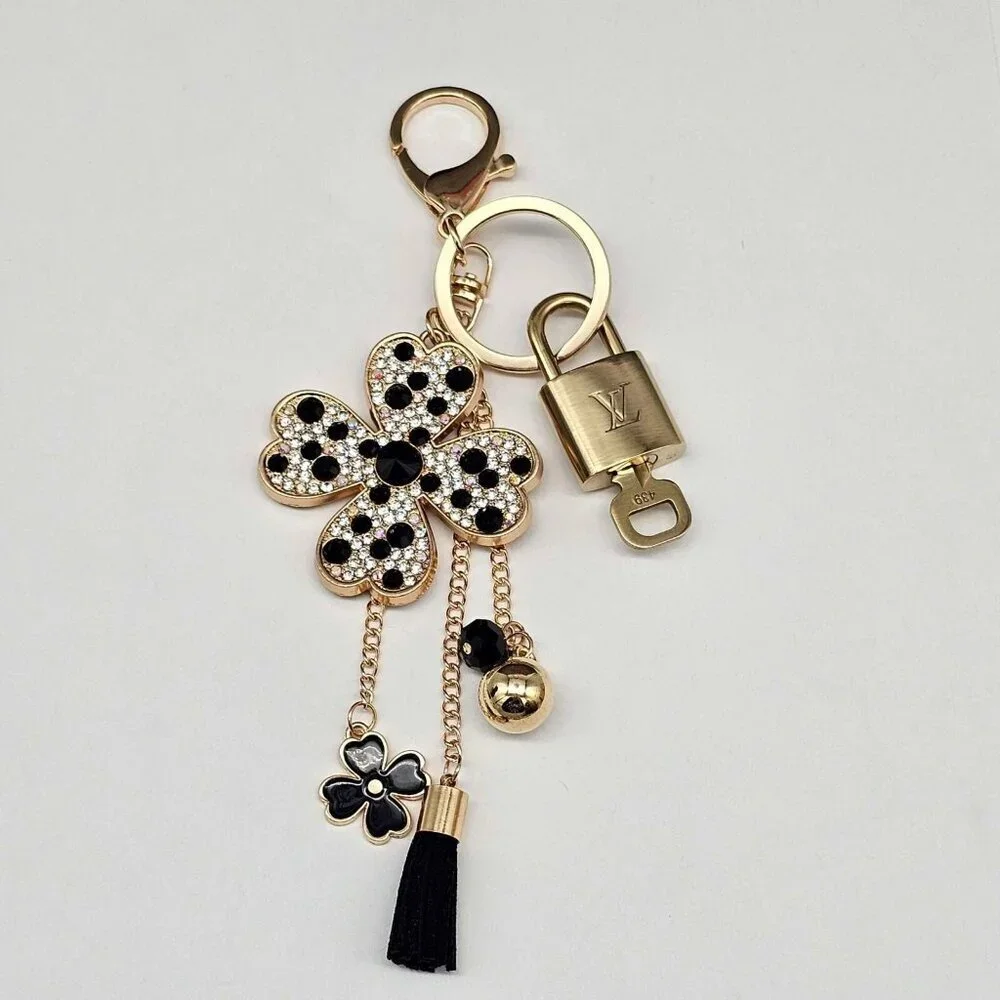 Authentic Louis Vuitton Lock & Key with unbranded Flower Bagcharm, Keycharm